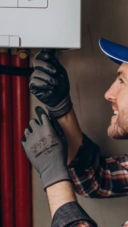 Man repairing heating equipment
